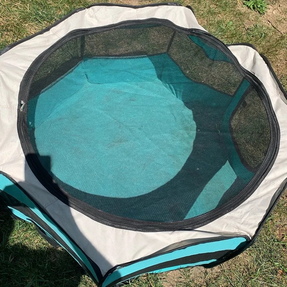 Used Aliparr animal safe zone with zipper top. It had some wear needs cleaned.